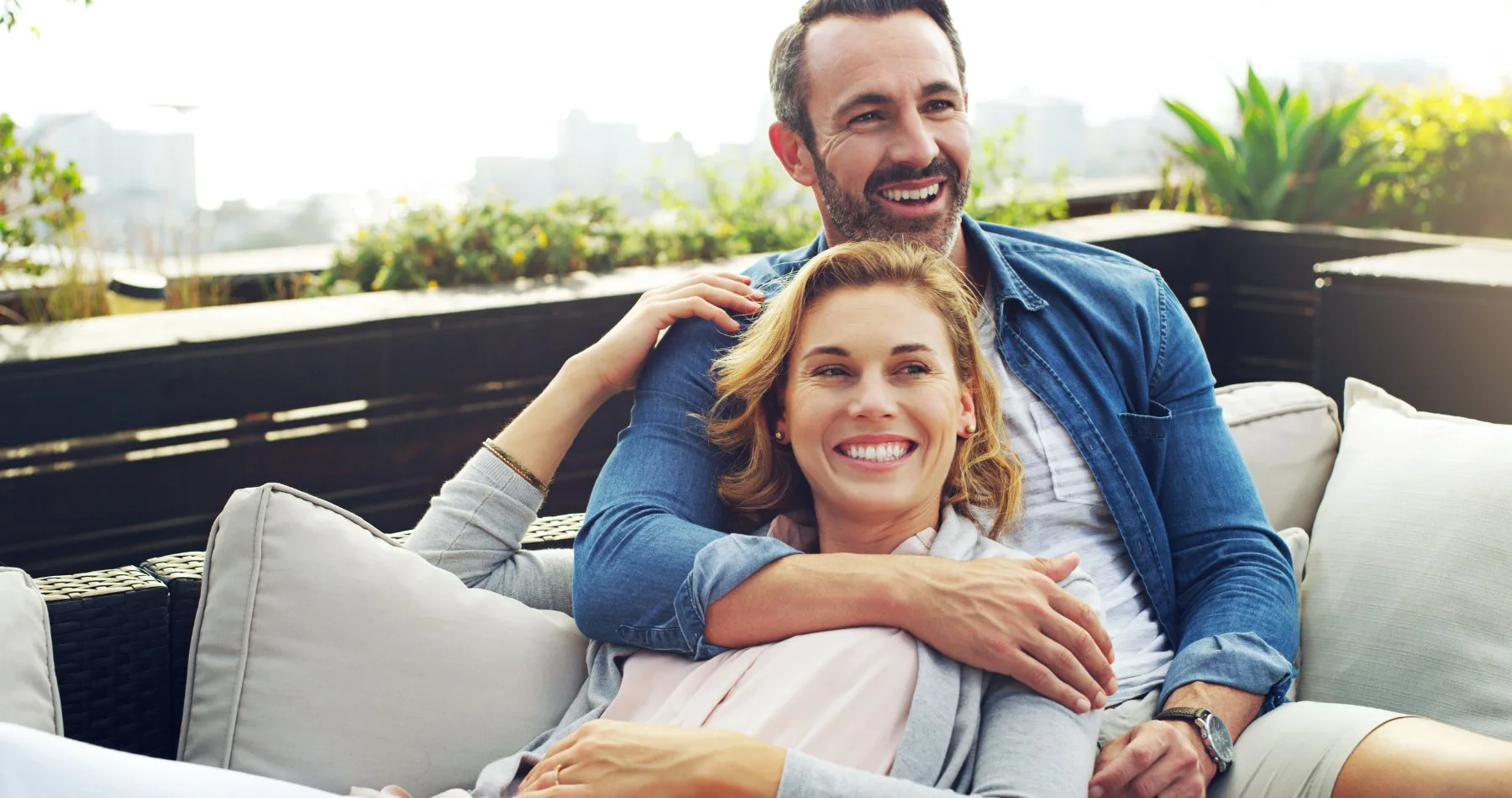 Happy Couple Outside Couch